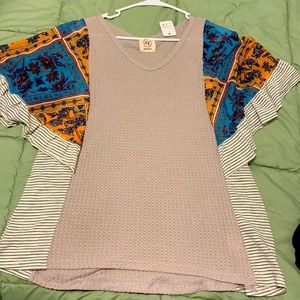 Medium Grace & Emma boutique top.